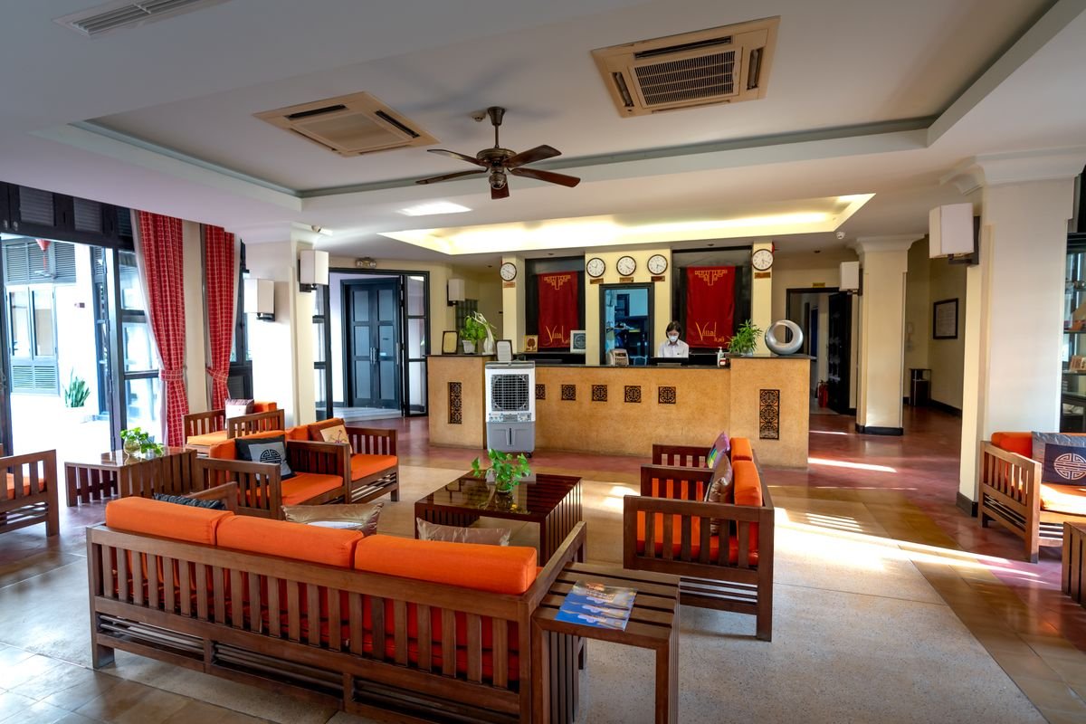 Hotel reception desk and lobby seating area